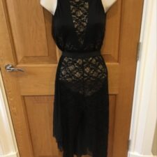 Black lace catsuit with long skirt