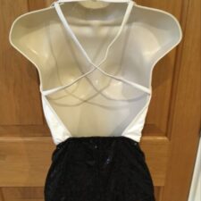 White and black biketard with shirt front and sparkle shorts