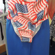American flag leotard with blue trousers