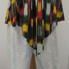 White  faux leather trousers and multi-coloured top