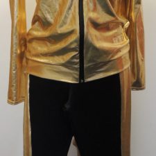 Gold metallic jacket and black track bottoms