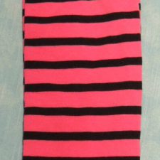 Pink and black striped arm warmers