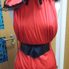 Red and black dress with belt and hat