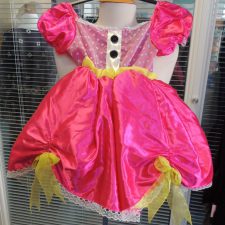 Bright pink tutu with yellow bows