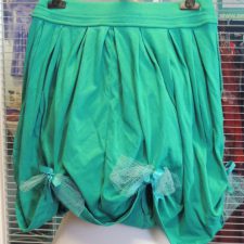 Green skirt with bows
