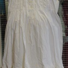 White cotton dress with ruffle hem