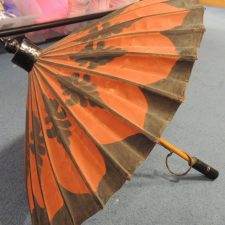 Brown and black parasol