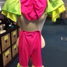 Salsa style hot pink and yellow crop top and trousers
