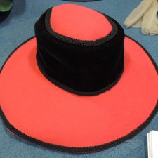Red and black felt hat
