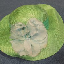 Green hat with flower