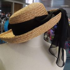 Straw hat with black mesh bow
