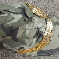 Camouflage cap with gold sequin trim