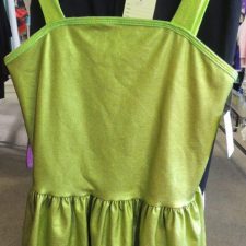 Sparkle green skirted dance top with black cropped trousers