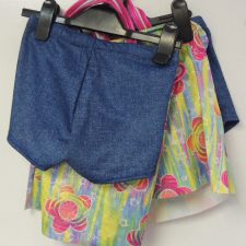 Bright flowered top and denim shorts