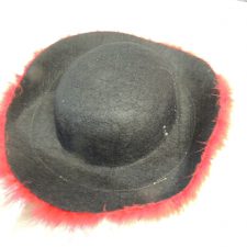Black hat with red fur trim