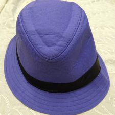 Purple trilby hat with black band