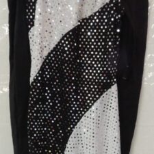 Black, white, silver angled top and capri leggings