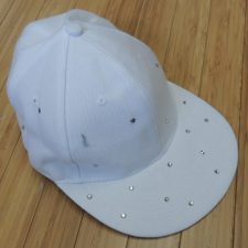 White cap with silver sparkles
