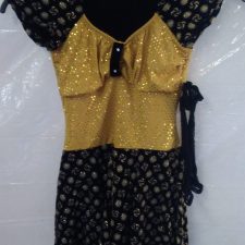 Gold and black sparkle skirted leotard