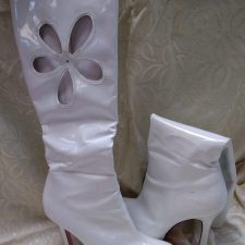 White patent platform boots with cut out flower design