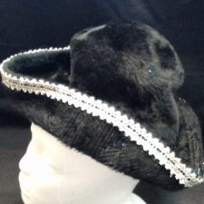 Black fur hat with silver trim