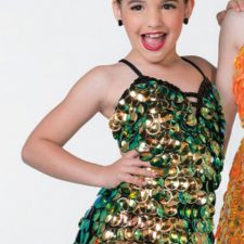 Black dress with hanging iridescent green and gold disc sparkles