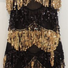 Black and gold sequin and fringe dress