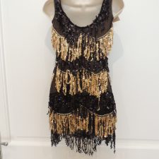 Black and gold sequin and fringe dress