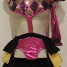 Patchwork design sparkle leotard with cut out middle and ruffle bustle skirt