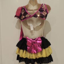Patchwork design sparkle leotard with cut out middle and ruffle bustle skirt