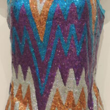 Zig zag pattern sequin leotard with turquoise, purple and copper and a turquoise feather bustle (not shown)