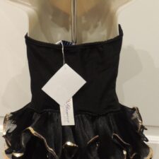 Black and beige sparkle skirted leotard with ruffled skirt and straps and sequin floral bodice