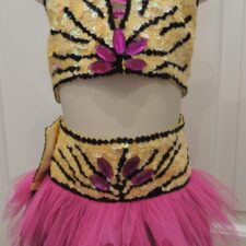Yellow and pink sparkle crop top and skirt with black line detail