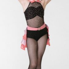 Peach and black leotard with mesh detail and ruffled bustle