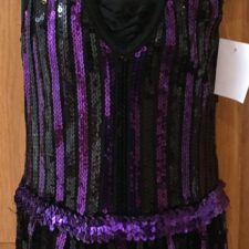 Purple and black sequin leotard with fringe skirt