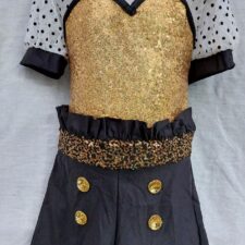 Black and white spotty biketard with gold sequin bodice and peter pan collar and gloves