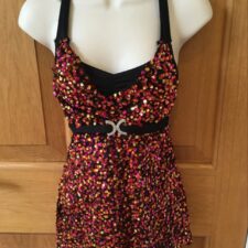 Black, red and gold sparkle skirted leotard with belt