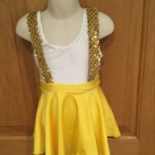 White and yellow skirted leotard with gold braces