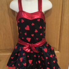 Black and red metallic skirted leotard with hearts design