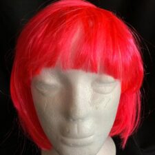 Neon pink bowl cut wig