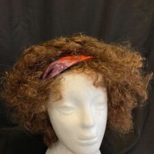 Brown curly afro with 60's headband