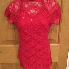 Lace skirted biketard with lace up back and angled hem