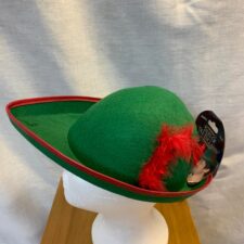 Green Robin Hood hat with red trim and feather