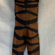 Black catsuit with brown stripes