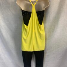 Black and yellow all in one with sequin draped bodice and cropped trousers