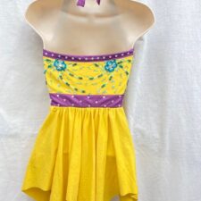 Yellow dress with handkerchief hem and purple and turquoise beaded detail