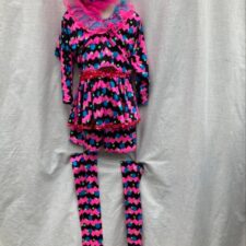 Hot pink, black and turquoise skirted bike shorts, crop top, hat and boot covers