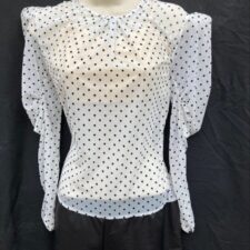 Black biketard with black and white spotty sheer over top and puff sleeves
