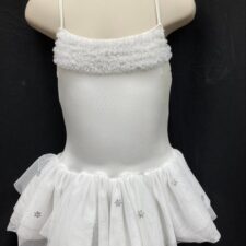 White skirted leotard with silver snowflakes