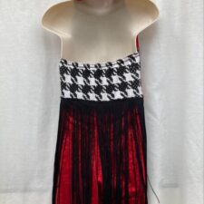 Red, black and white skirted biketard with fringe and boot covers